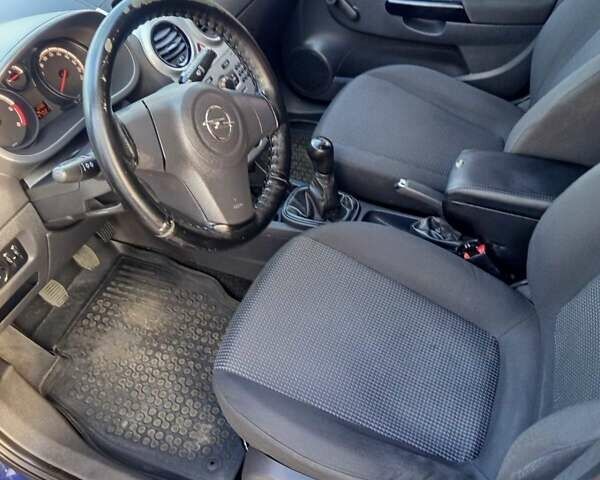 Синий Опель Корса, объемом двигателя 1.3 л и пробегом 247 тыс. км за 5000 $, фото 2 на Automoto.ua