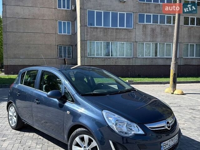 Синий Опель Корса, объемом двигателя 1.4 л и пробегом 209 тыс. км за 6000 $, фото 5 на Automoto.ua