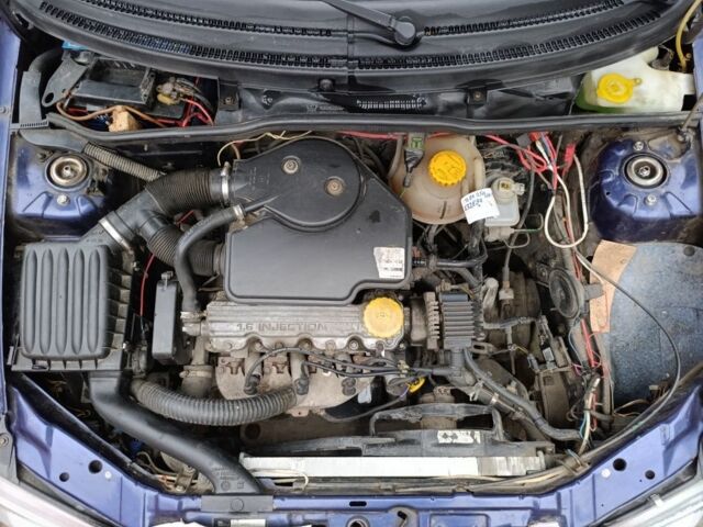 Синій Опель Корса, об'ємом двигуна 1.2 л та пробігом 200 тис. км за 1750 $, фото 11 на Automoto.ua