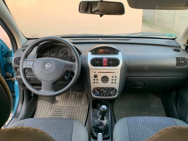 Синий Опель Корса, объемом двигателя 1.2 л и пробегом 200 тыс. км за 1300 $, фото 4 на Automoto.ua