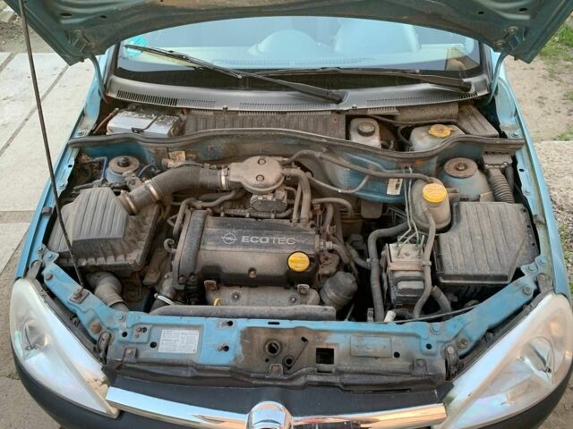 Синий Опель Корса, объемом двигателя 1.2 л и пробегом 200 тыс. км за 1300 $, фото 5 на Automoto.ua