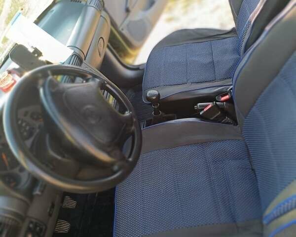 Зеленый Опель Корса, объемом двигателя 1.2 л и пробегом 300 тыс. км за 1900 $, фото 1 на Automoto.ua