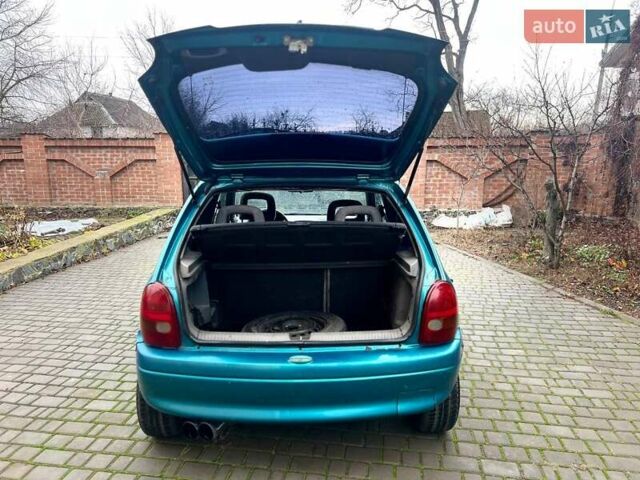 Зеленый Опель Корса, объемом двигателя 1.2 л и пробегом 315 тыс. км за 1450 $, фото 9 на Automoto.ua