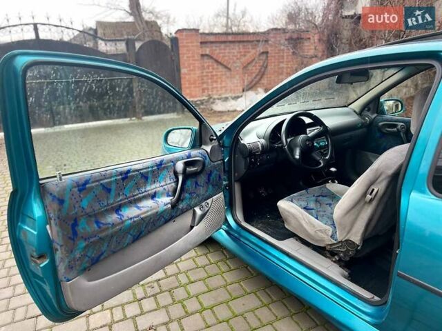 Зеленый Опель Корса, объемом двигателя 1.2 л и пробегом 315 тыс. км за 1450 $, фото 7 на Automoto.ua