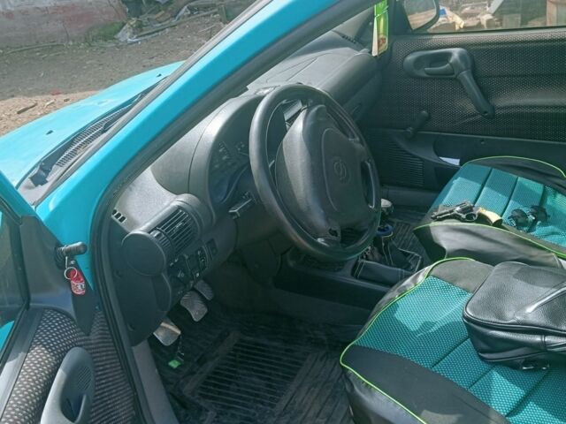 Зелений Опель Корса, об'ємом двигуна 1.2 л та пробігом 300 тис. км за 831 $, фото 3 на Automoto.ua