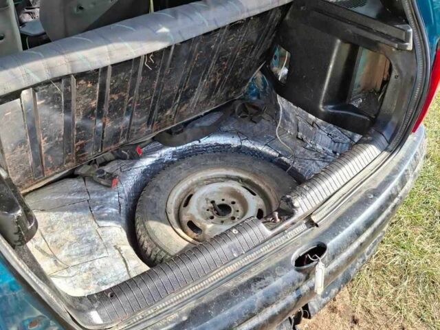 Зеленый Опель Корса, объемом двигателя 1.2 л и пробегом 248 тыс. км за 1400 $, фото 1 на Automoto.ua