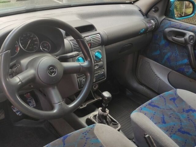 Зеленый Опель Корса, объемом двигателя 1.4 л и пробегом 314 тыс. км за 1300 $, фото 7 на Automoto.ua