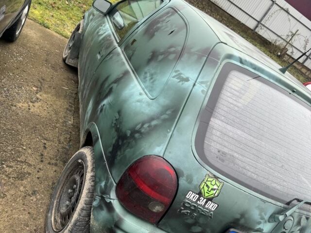 Зеленый Опель Корса, объемом двигателя 0 л и пробегом 100 тыс. км за 399 $, фото 4 на Automoto.ua