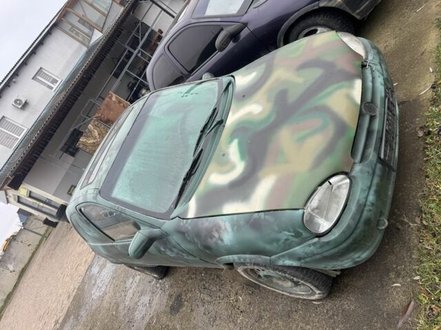 Зеленый Опель Корса, объемом двигателя 0 л и пробегом 100 тыс. км за 399 $, фото 2 на Automoto.ua