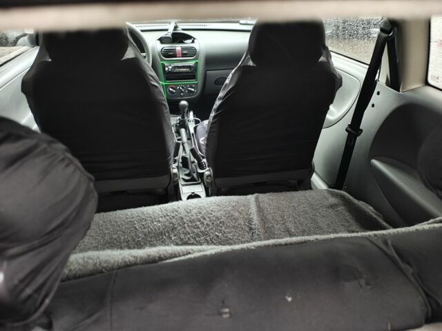 Зелений Опель Корса, об'ємом двигуна 1 л та пробігом 250 тис. км за 3700 $, фото 7 на Automoto.ua