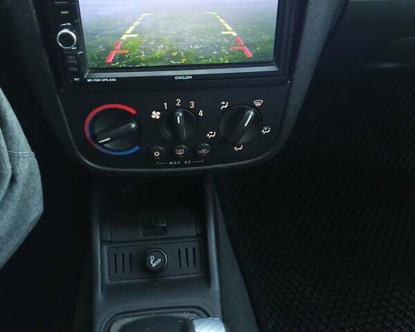 Зелений Опель Корса, об'ємом двигуна 0.97 л та пробігом 185 тис. км за 3400 $, фото 11 на Automoto.ua