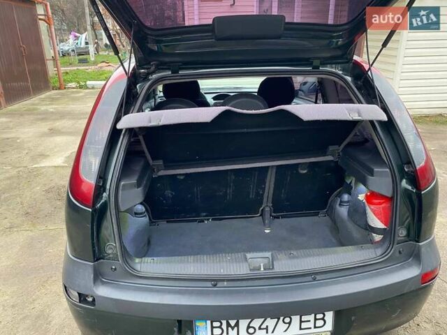 Зелений Опель Корса, об'ємом двигуна 0.97 л та пробігом 392 тис. км за 2200 $, фото 11 на Automoto.ua