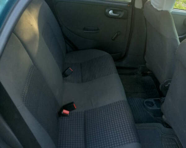 Зеленый Опель Корса, объемом двигателя 1.2 л и пробегом 220 тыс. км за 2900 $, фото 6 на Automoto.ua