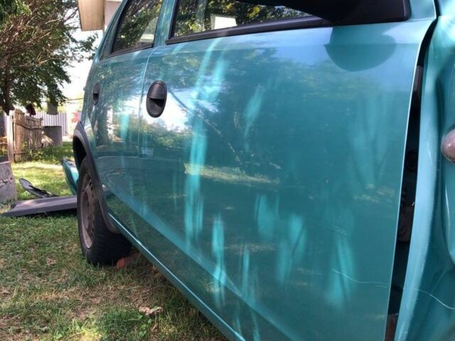 Зелений Опель Корса, об'ємом двигуна 1 л та пробігом 180 тис. км за 900 $, фото 1 на Automoto.ua