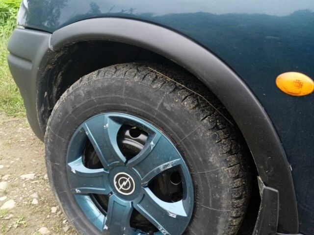 Зеленый Опель Корса, объемом двигателя 1.4 л и пробегом 276 тыс. км за 2900 $, фото 6 на Automoto.ua