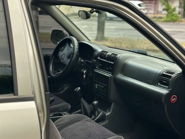 Бежевий Опель Фронтера, об'ємом двигуна 2.2 л та пробігом 200 тис. км за 2900 $, фото 4 на Automoto.ua