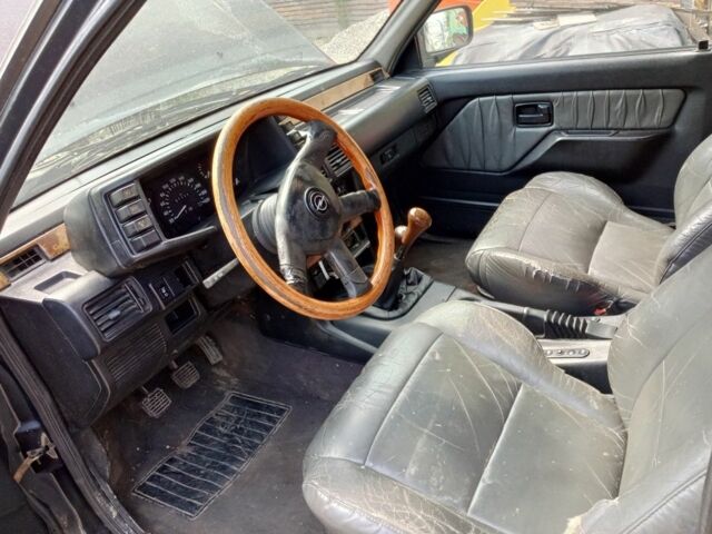 Черный Опель Фронтера, объемом двигателя 0 л и пробегом 257 тыс. км за 3750 $, фото 2 на Automoto.ua