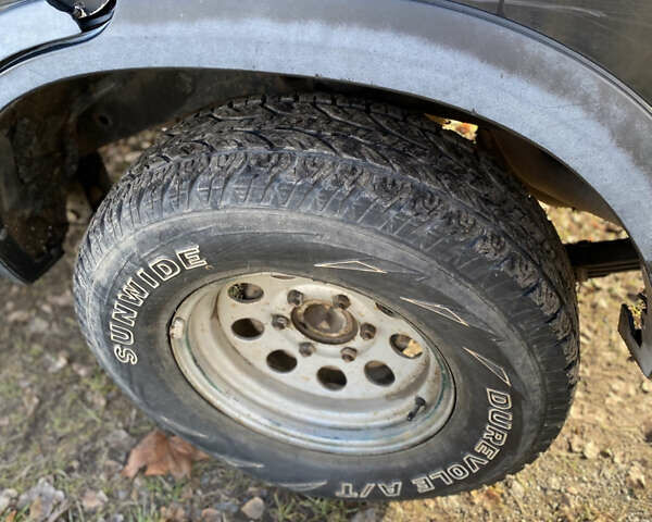 Черный Опель Фронтера, объемом двигателя 2.3 л и пробегом 287 тыс. км за 2750 $, фото 24 на Automoto.ua