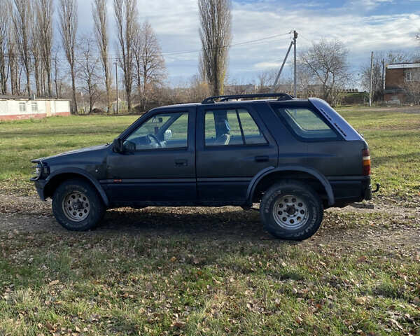 Черный Опель Фронтера, объемом двигателя 2.3 л и пробегом 287 тыс. км за 2750 $, фото 5 на Automoto.ua