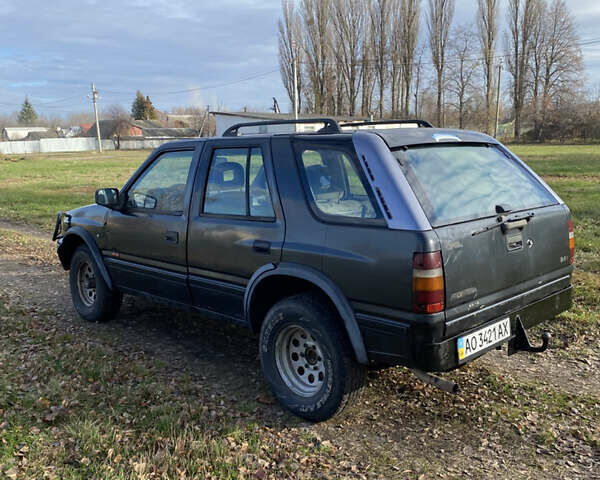 Черный Опель Фронтера, объемом двигателя 2.3 л и пробегом 287 тыс. км за 2750 $, фото 4 на Automoto.ua