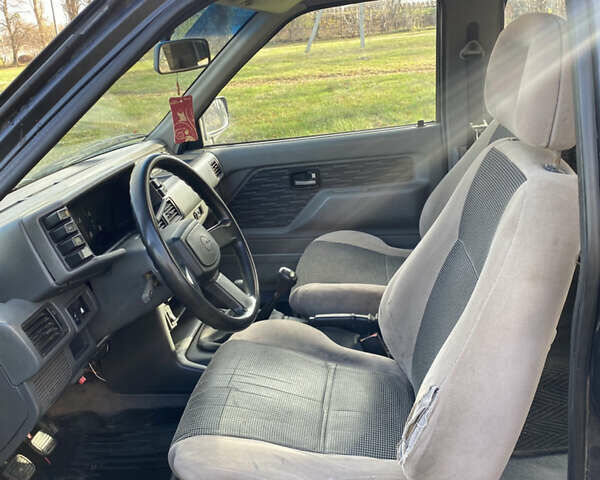 Черный Опель Фронтера, объемом двигателя 2.3 л и пробегом 287 тыс. км за 2750 $, фото 9 на Automoto.ua