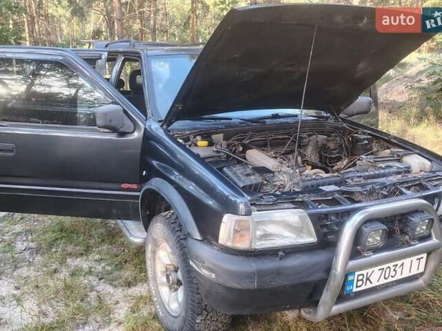 Черный Опель Фронтера, объемом двигателя 2.4 л и пробегом 319 тыс. км за 4800 $, фото 3 на Automoto.ua