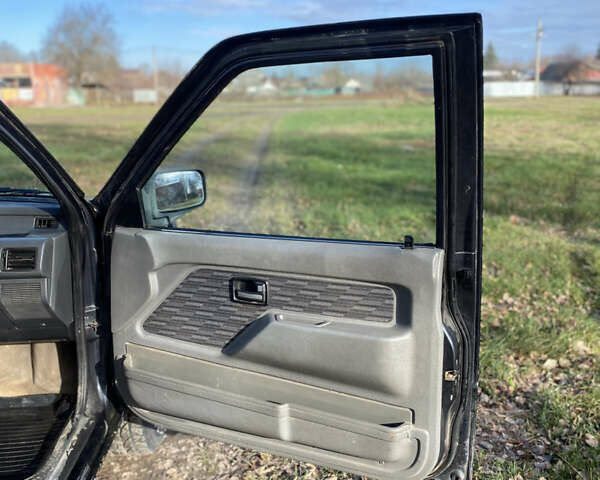 Черный Опель Фронтера, объемом двигателя 2.3 л и пробегом 287 тыс. км за 2750 $, фото 13 на Automoto.ua