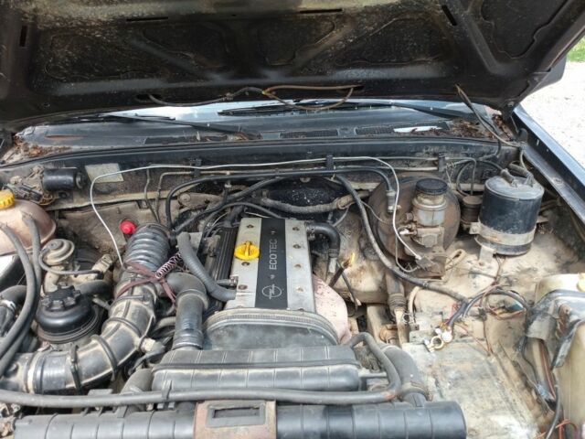 Черный Опель Фронтера, объемом двигателя 0 л и пробегом 257 тыс. км за 3750 $, фото 3 на Automoto.ua