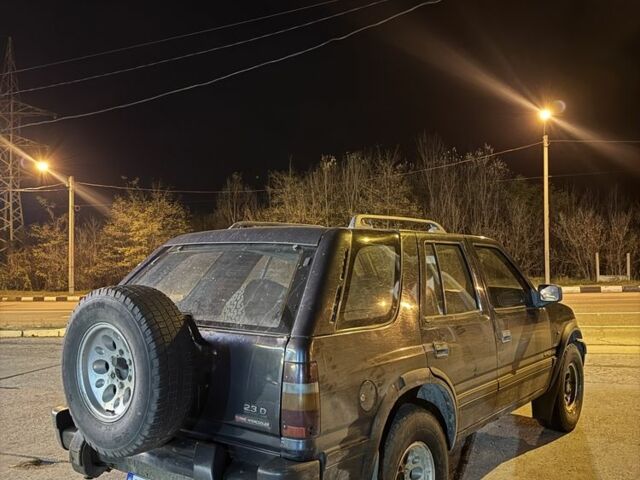 Черный Опель Фронтера, объемом двигателя 2.3 л и пробегом 300 тыс. км за 2600 $, фото 3 на Automoto.ua