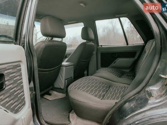 Черный Опель Фронтера, объемом двигателя 2.3 л и пробегом 505 тыс. км за 3700 $, фото 9 на Automoto.ua