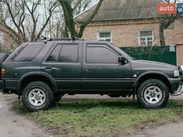 Черный Опель Фронтера, объемом двигателя 2.3 л и пробегом 505 тыс. км за 3700 $, фото 3 на Automoto.ua