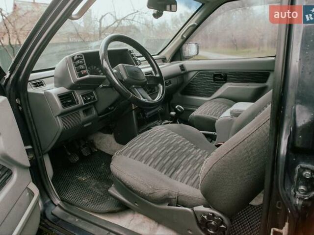 Черный Опель Фронтера, объемом двигателя 2.3 л и пробегом 505 тыс. км за 3700 $, фото 8 на Automoto.ua