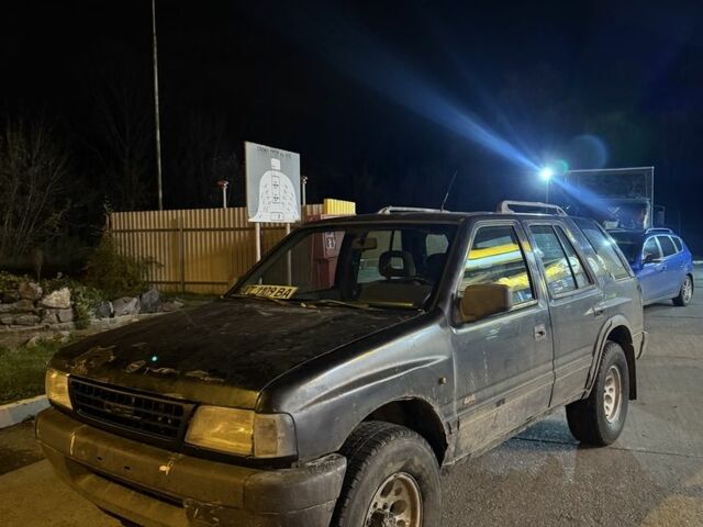 Черный Опель Фронтера, объемом двигателя 2.3 л и пробегом 300 тыс. км за 2600 $, фото 1 на Automoto.ua