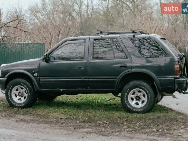 Черный Опель Фронтера, объемом двигателя 2.3 л и пробегом 505 тыс. км за 3700 $, фото 6 на Automoto.ua