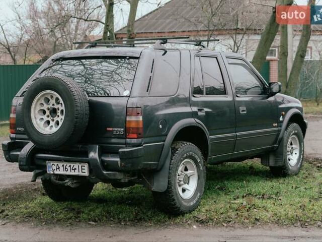 Черный Опель Фронтера, объемом двигателя 2.3 л и пробегом 505 тыс. км за 3700 $, фото 5 на Automoto.ua