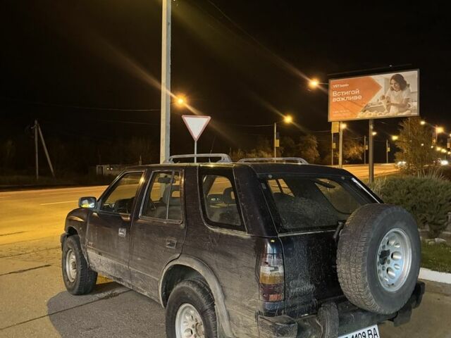 Черный Опель Фронтера, объемом двигателя 2.3 л и пробегом 300 тыс. км за 2600 $, фото 2 на Automoto.ua