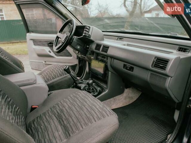 Черный Опель Фронтера, объемом двигателя 2.3 л и пробегом 505 тыс. км за 3700 $, фото 11 на Automoto.ua