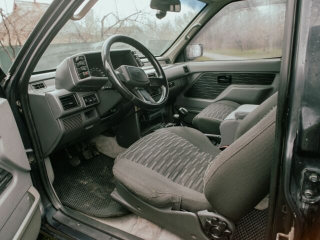 Черный Опель Фронтера, объемом двигателя 2.3 л и пробегом 505 тыс. км за 3700 $, фото 7 на Automoto.ua