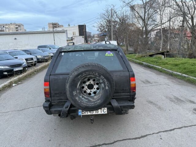 Черный Опель Фронтера, объемом двигателя 2.2 л и пробегом 300 тыс. км за 2300 $, фото 5 на Automoto.ua