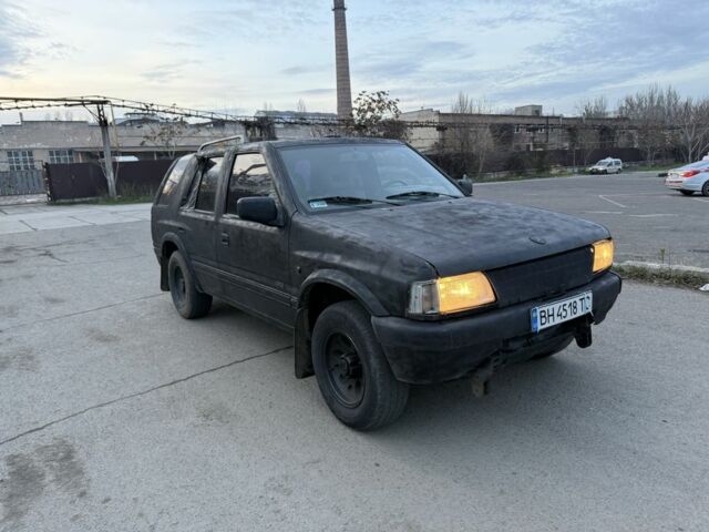 Черный Опель Фронтера, объемом двигателя 2.2 л и пробегом 300 тыс. км за 2300 $, фото 2 на Automoto.ua