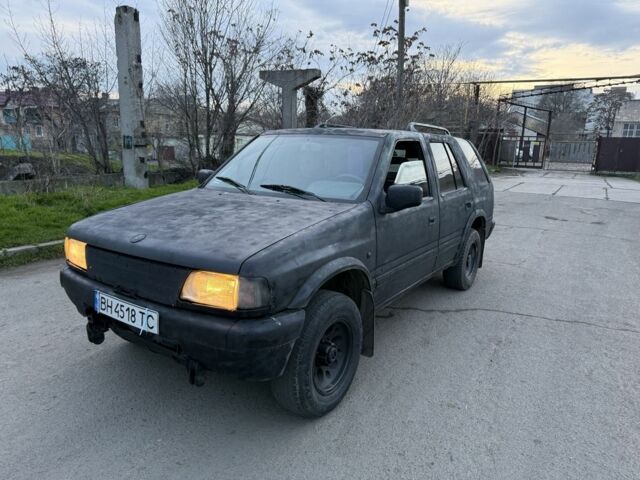 Черный Опель Фронтера, объемом двигателя 2.2 л и пробегом 300 тыс. км за 2300 $, фото 1 на Automoto.ua