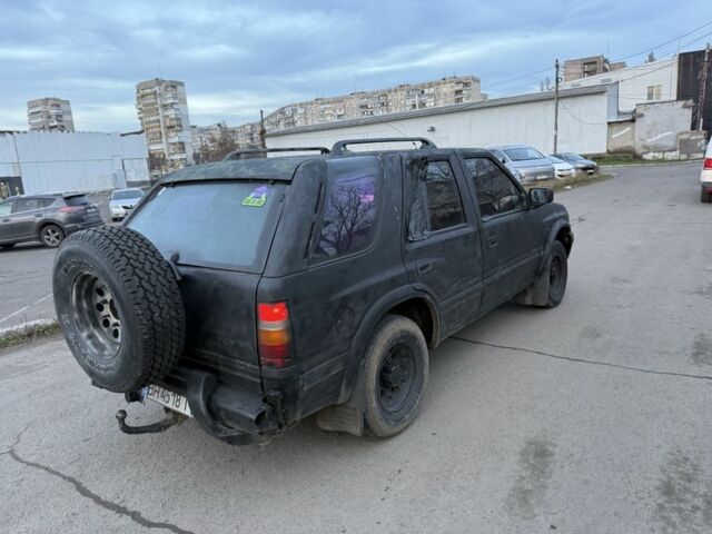 Черный Опель Фронтера, объемом двигателя 2.2 л и пробегом 300 тыс. км за 2300 $, фото 4 на Automoto.ua