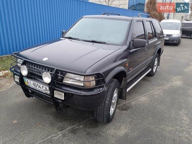 Черный Опель Фронтера, объемом двигателя 2.2 л и пробегом 329 тыс. км за 4999 $, фото 32 на Automoto.ua