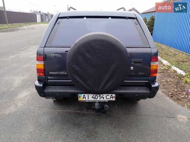 Черный Опель Фронтера, объемом двигателя 2.2 л и пробегом 329 тыс. км за 4999 $, фото 26 на Automoto.ua