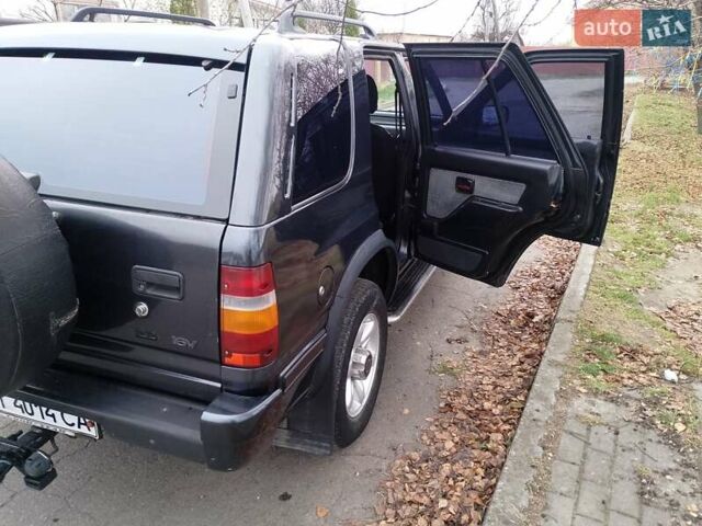 Черный Опель Фронтера, объемом двигателя 2.2 л и пробегом 329 тыс. км за 4999 $, фото 3 на Automoto.ua
