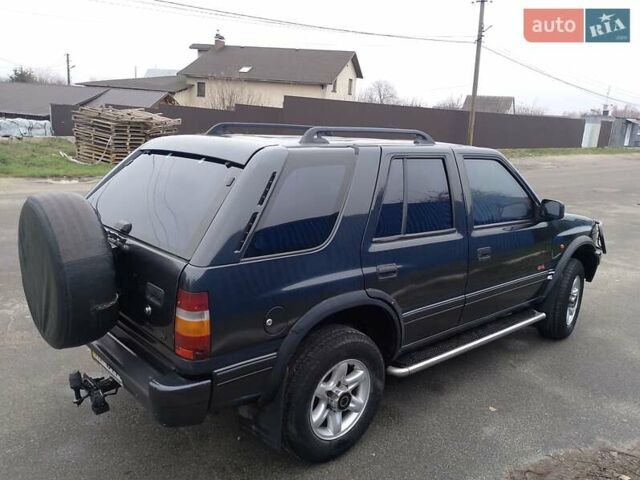 Черный Опель Фронтера, объемом двигателя 2.2 л и пробегом 329 тыс. км за 4999 $, фото 28 на Automoto.ua