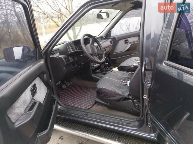 Черный Опель Фронтера, объемом двигателя 2.2 л и пробегом 329 тыс. км за 4999 $, фото 7 на Automoto.ua