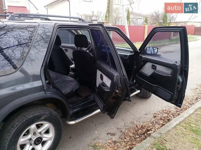 Черный Опель Фронтера, объемом двигателя 2.2 л и пробегом 329 тыс. км за 4999 $, фото 4 на Automoto.ua