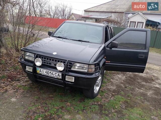 Черный Опель Фронтера, объемом двигателя 2.2 л и пробегом 329 тыс. км за 4999 $, фото 23 на Automoto.ua