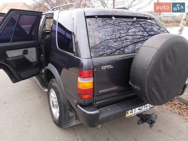 Черный Опель Фронтера, объемом двигателя 2.2 л и пробегом 329 тыс. км за 4999 $, фото 2 на Automoto.ua